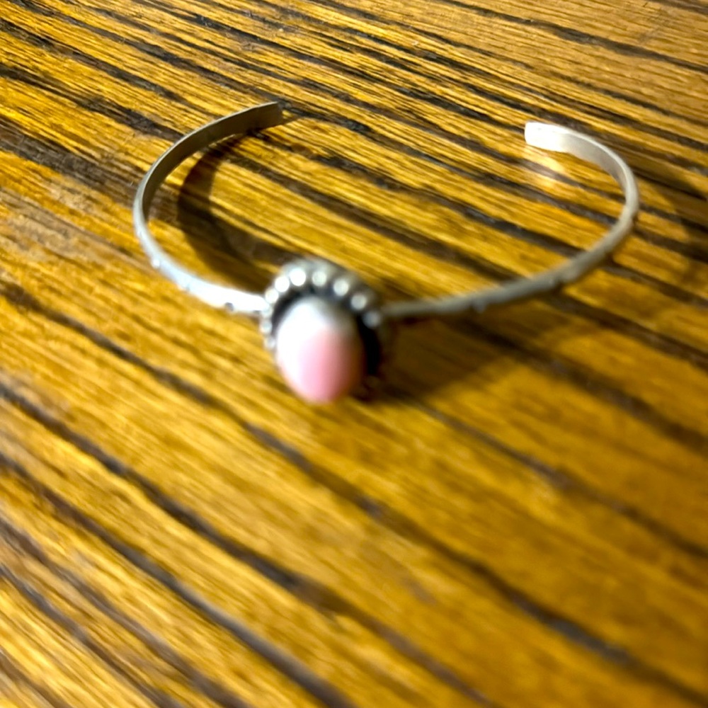 Pink conch native stamped cuff